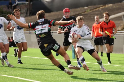 101026 Swansea RFC v Ebbw Vale, Super Rugbi Cymru - Harvey James of Swansea is tackled by Dylan Edwards of Ebbw Vale