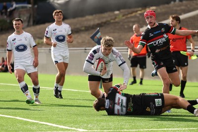 101026 Swansea RFC v Ebbw Vale, Super Rugbi Cymru - Harvey James of Swansea is tackled by Dylan Edwards of Ebbw Vale