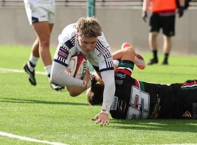 101026 Swansea RFC v Ebbw Vale, Super Rugbi Cymru - Harvey James of Swansea is tackled by Dylan Edwards of Ebbw Vale