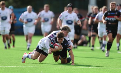 101026 Swansea RFC v Ebbw Vale, Super Rugbi Cymru - Morgan Rees of Ebbw Vale is tackled