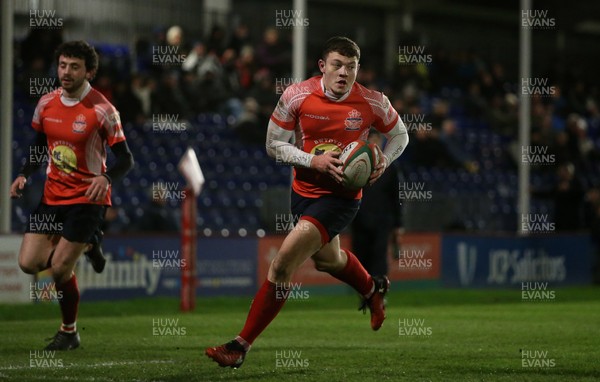 110117 - Swansea RFC v Llanelli RFC - Fosters Cup - Ashley Evans of Llanelli runs in to score a try by Chris Fairweather/Huw Evans Agency