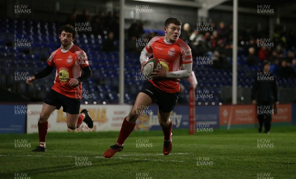 110117 - Swansea RFC v Llanelli RFC - Fosters Cup - Ashley Evans of Llanelli runs in to score a try by Chris Fairweather/Huw Evans Agency