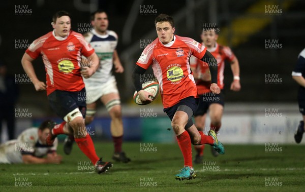 110117 - Swansea RFC v Llanelli RFC - Fosters Cup - Ioan Hughes of Llanelli makes a break by Chris Fairweather/Huw Evans Agency