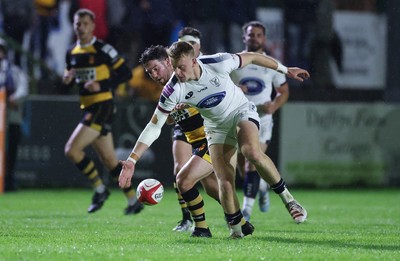 021025 - Swansea RFC v Newport RFC, Super Rygbi Cymru - Lewis Edwards of Swansea  and Matt O’Brien of Newport compete for the ball