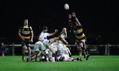 021025 - Swansea RFC v Newport RFC, Super Rygbi Cymru - Josh Skinner of Newport looks to charge down the kick by Iwan Temblett of Swansea