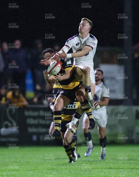 021025 - Swansea RFC v Newport RFC, Super Rygbi Cymru - Lewis Edwards of Swansea  and Matt O’Brien of Newport compete for the ball