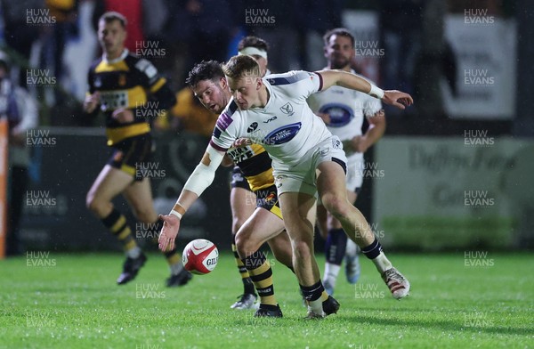 021025 - Swansea RFC v Newport RFC, Super Rygbi Cymru - Lewis Edwards of Swansea  and Matt O’Brien of Newport compete for the ball