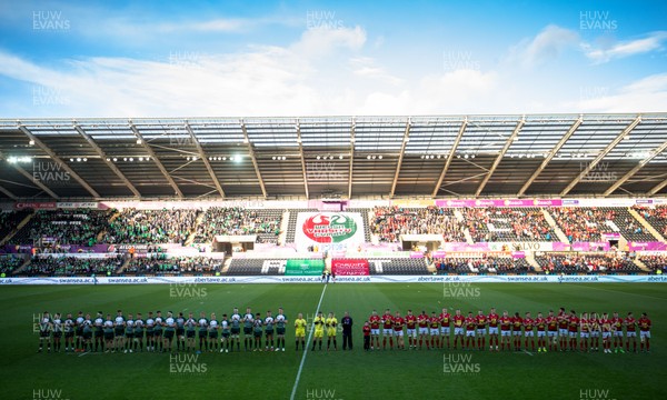 250418 - Swansea University v Cardiff University, Welsh Varsity rugby match - A minutes applause takes place in memory of Doncaster prop forward, and former Swansea player, Ian Williams who died during training with his club in February