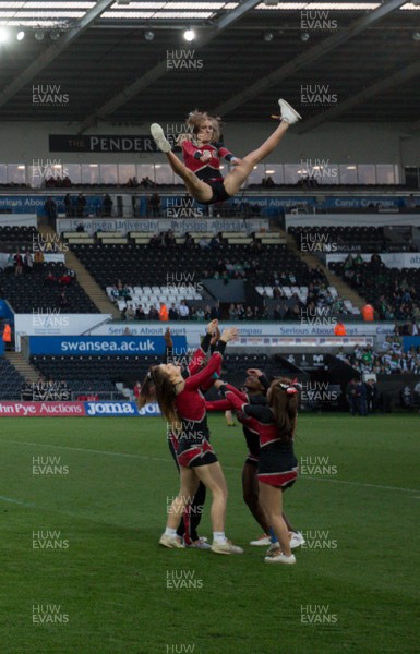 250418 - Swansea University v Cardiff University, Welsh Varsity rugby match - Cheerleaders from Cardiff University go through their routine at half time