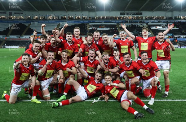 250418 - Swansea University v Cardiff University, Welsh Varsity rugby match - Cardiff University celebrate after winning the Welsh Varsity Match