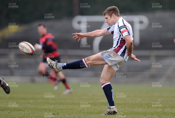 230313 - Swansea v Aberavon - SWALEC Cup Quarter Final -Nicky Thomas of Swansea kicks 