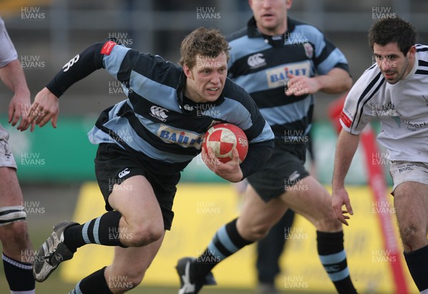 25.03.07..Cardiff v Swansea, Konica Minolta Cup Quarter Final Cardiff's Nick Gill bursts through on his way to scoring try 