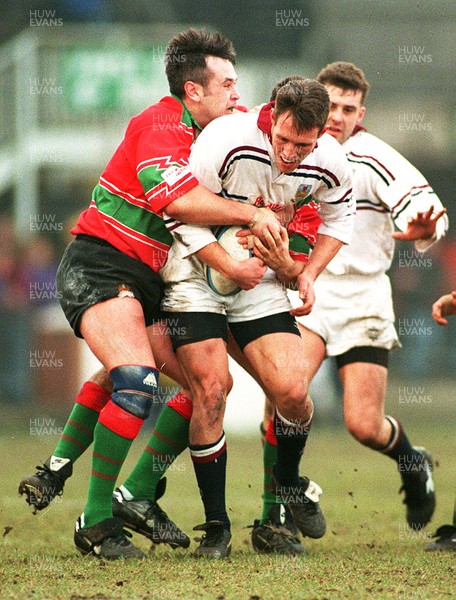 250197 - Swansea v Dunant - Mark Taylor of Swansea is tackled by Dean Evans