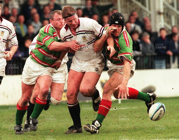 050497 - Swansea v Ebbw Vale - Stuart Davies of Swansea loses the ball between Paul Hudson and Paul Pook