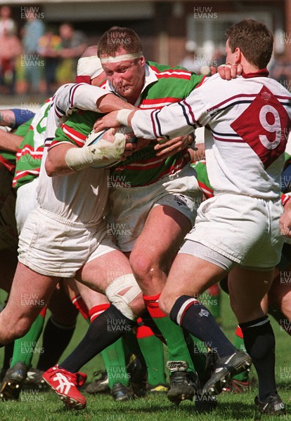 120497 - Swansea v Ebbw Vale - Mark Jones drives past Alan Reynolds and Andy Booth