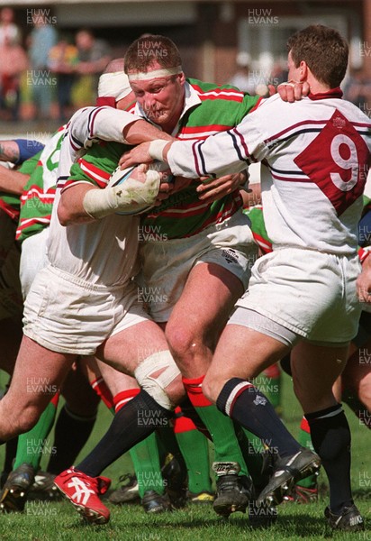 120497 - Swansea v Ebbw Vale - Mark Jones drives past Alan Reynolds and Andy Booth