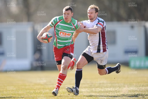 060413 - Swansea v Llandovery - Principality Premiership -Adam Warren of Llandovery gets past Chris Shelmerdile of Swansea 