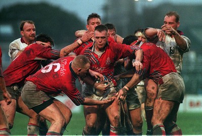 101294 - Swansea v Llanelli - Lee Williams and Craig Quinnell hide the ball