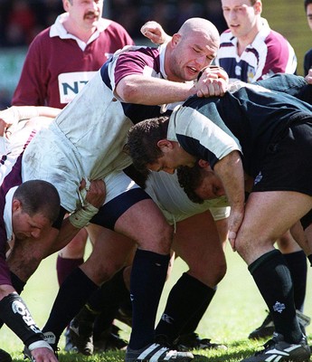 240499 - Swansea v London Irish - Roommates when playing for Wales, Ben Evans of Swansea and Peter Rogers of London Irish meet in the scrum 