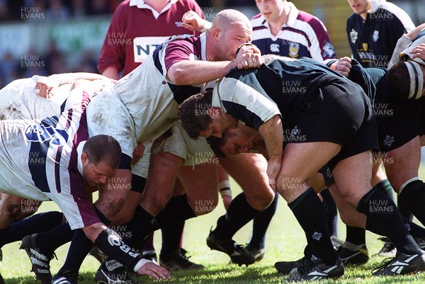 240499 - Swansea v London Irish - Roommates when playing for Wales, Ben Evans of Swansea and Peter Rogers of London Irish meet in the scrum 