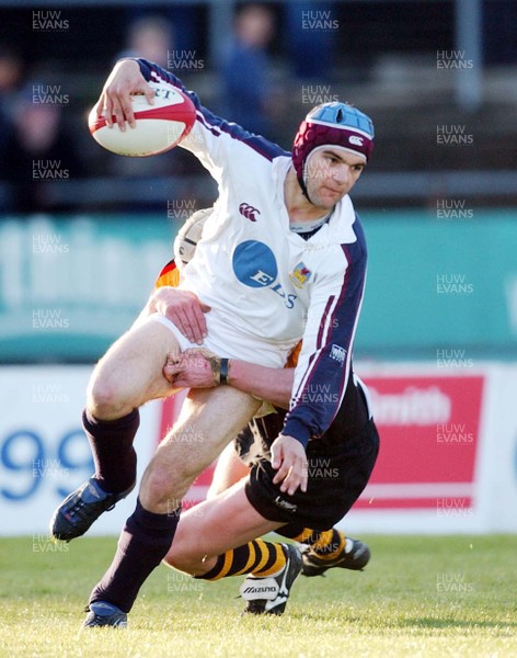 130503 - Swansea v Newport - Welsh Premiership - Swansea's Robert Sweeney is caught by Rhys Thomas 