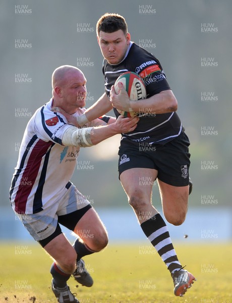 020313 - Swansea v Pontypridd - Principality Premiership -Gary Williams of Pontypridd gets past David Watts of Swansea to score try