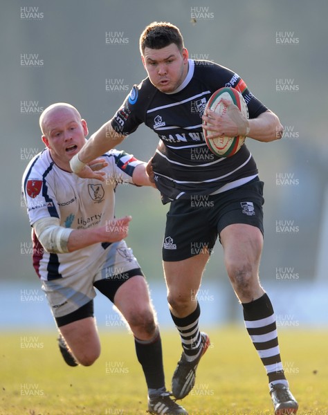 020313 - Swansea v Pontypridd - Principality Premiership -Gary Williams of Pontypridd gets past David Watts of Swansea to score try