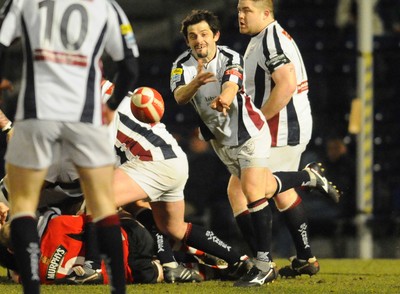 12.03.10 - Principality Premiership Rugby, Swansea v Pontypridd Swansea's Rhodri Wells releases the ball 