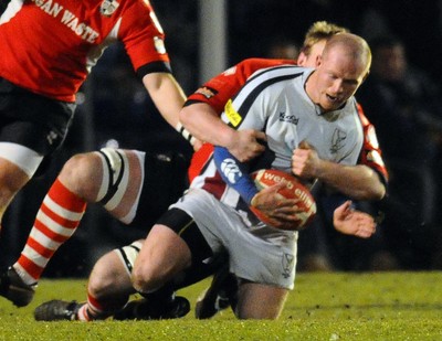 12.03.10 - Principality Premiership Rugby, Swansea v Pontypridd Swansea's David Watts is brought down 