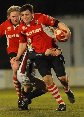 12.03.10 - Principality Premiership Rugby, Swansea v Pontypridd Ponty's Adam Thomas tries to get through 