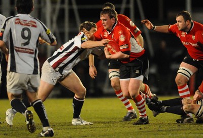 12.03.10 - Principality Premiership Rugby, Swansea v Pontypridd Ponty's Kristian Dacey tries to get through 