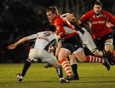 12.03.10 - Principality Premiership Rugby, Swansea v Pontypridd Ponty's Kristian Dacey tries to get through 