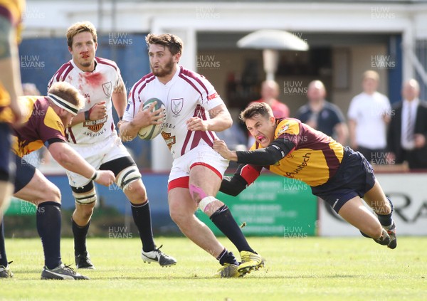 190915 Swansea RFC v Tata Steel RFC - SWALEC Championship -Josh Flye of Swansea is tackled by Simon Evans of Tata Steel