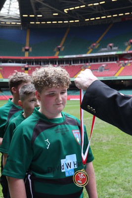 210324 - Swansea Valley v Mynydd Mawr - Welsh Schools Junior Group U11 DC Thomas Bowl Final - Players receive medals   