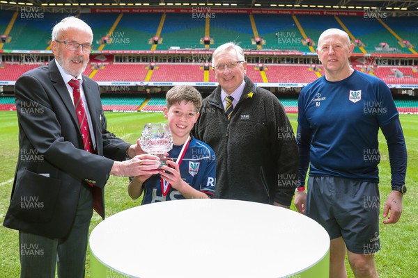 210324 - Swansea Valley v Mynydd Mawr - Welsh Schools Junior Group U11 DC Thomas Bowl Final - Idris Power of the WRU hands the trophy to the Mynydd Mawr captain alongside Roy Bergiers and Roy James of MMAD 