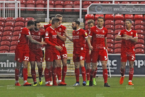 081218 - Swindon Town v Newport County, Sky Bet League 2 - Michael Doughty of Swindon Town (2nd left) celebrates scoring his side's first goal with team-mates