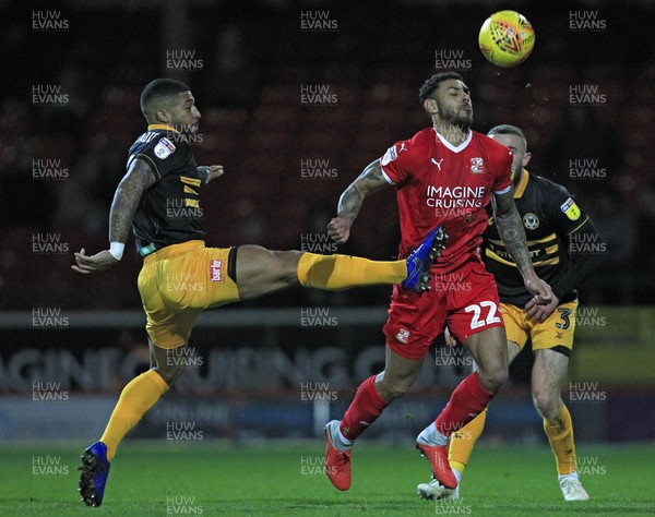 081218 - Swindon Town v Newport County, Sky Bet League 2 - Joss Labadie of Newport County (left) in action with Kaiyne Woolery of Swindon Town