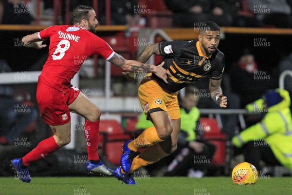 081218 - Swindon Town v Newport County, Sky Bet League 2 - Joss Labadie of Newport County (right) turns away from James Dunne of Swindon Town
