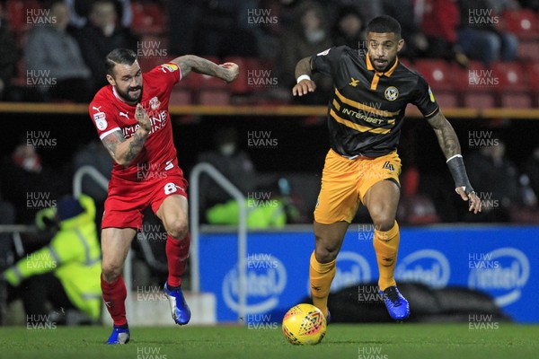 081218 - Swindon Town v Newport County, Sky Bet League 2 - Joss Labadie of Newport County and James Dunne of Swindon Town battle for the ball