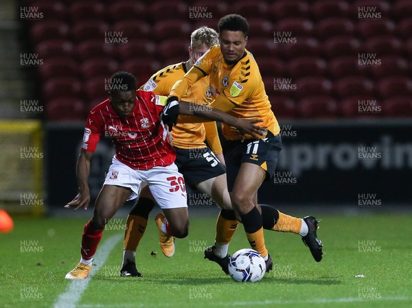 091121 - Swindon Town v Newport County, EFL Papa John's Trophy - Jermaine Hylton of Newport County and Mohammad Dabre of Swindon Town compete for the ball