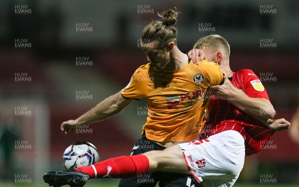 091121 - Swindon Town v Newport County, EFL Papa John's Trophy - Alex Fisher of Newport County is challenged by Callum Winchcombe of Swindon Town