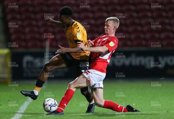091121 - Swindon Town v Newport County, EFL Papa John's Trophy - Timmy Abraham of Newport County is challenged by Callum Winchcombe of Swindon Town