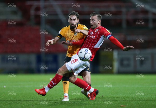 091121 - Swindon Town v Newport County, EFL Papa John's Trophy - Ed Upson of Newport County is tackled by Jordan Lyden of Swindon Town