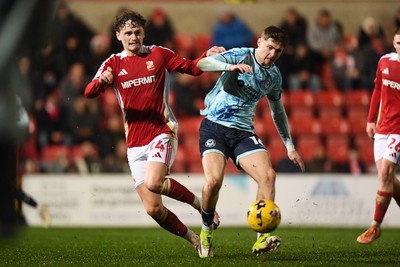 110226 - Swindon Town v Newport County - Sky Bet League 2 - James Crole of Newport County is challenged by Billy Kirkman of Swindon