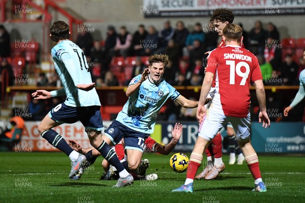 110226 - Swindon Town v Newport County - Sky Bet League 2 - Tom Davies of Newport County is tackled on the edge of the box