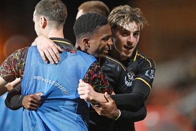 220926 - Swindon Town v Newport County - EFL Trophy -  Tanatswa Nyakuhwa of Newport County celebrates scoring a goal with team mates