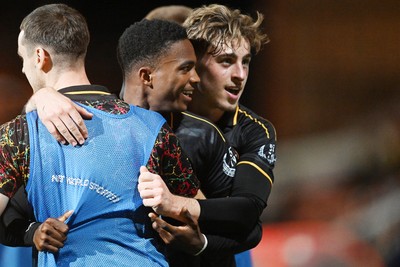 220926 - Swindon Town v Newport County - EFL Trophy -  Tanatswa Nyakuhwa of Newport County celebrates scoring a goal with team mates