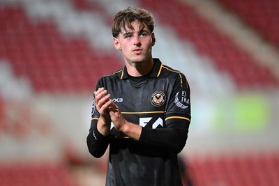 220926 - Swindon Town v Newport County - EFL Trophy -  Alfie Merritt of Newport County applauded fans at full time