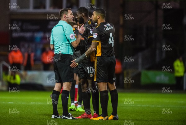 251117 - Swindon Town v Newport County - Sky Bet League 2 - Newport County forward Frank Nouble (10) is given a yellow card by referee James Linington