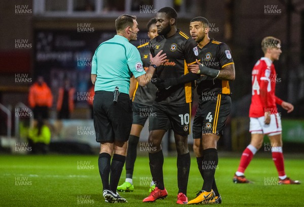 251117 - Swindon Town v Newport County - Sky Bet League 2 - Newport County forward Frank Nouble (10) is given a yellow card by referee James Linington
